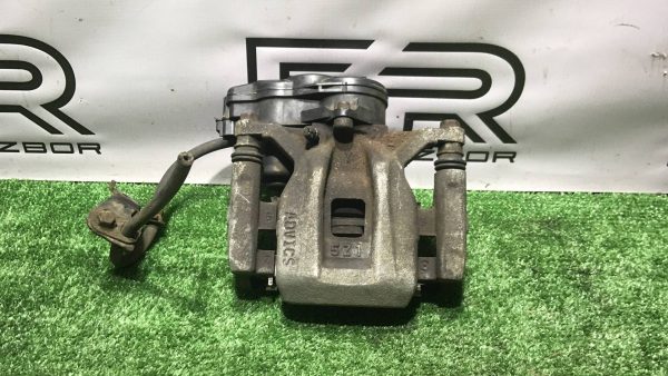 Суппорт тормозной задний левый Lexus RX