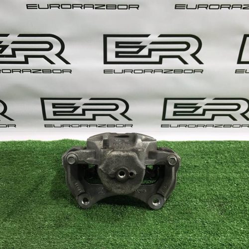 Суппорт тормозной передний левый Kia Sportage